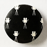 'Biograph Theater Button,' Photography, 6 x 6 inch prints, by Jere Kittle