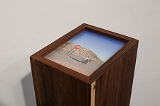 'Outside Four Corners Monument, AZ-CO-NM-UT (traveler)' Archival pigment print, walnut plywood, plexi, 47.5 H x 8 W x 10 L inches, by Kim Llerena and Nancy Daly